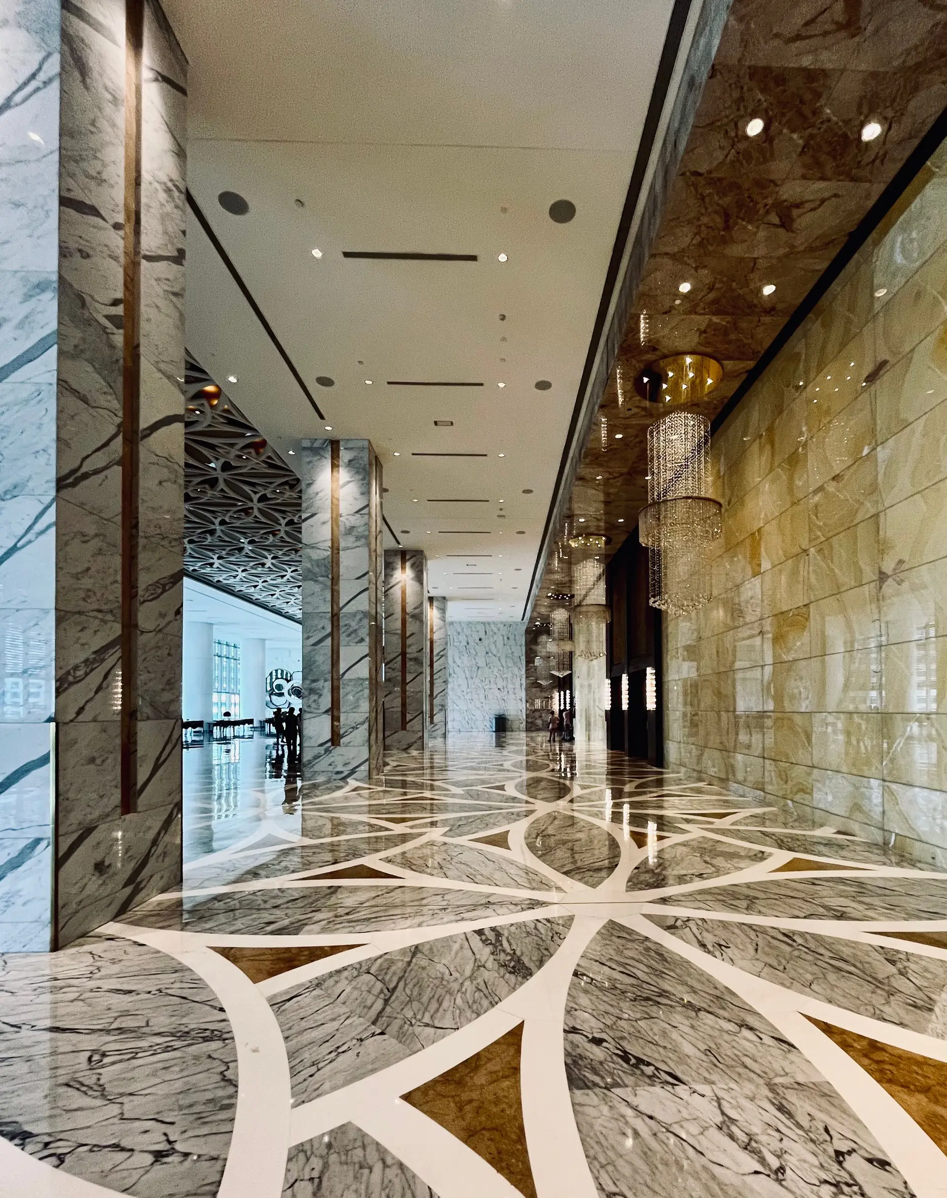 Luxurious hotel lobby with grand chandeliers